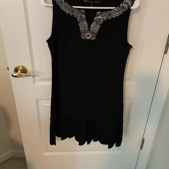 Black mini dress black and white store size S.Material polyester95%, spandex 5%. - Picture 1 of 7